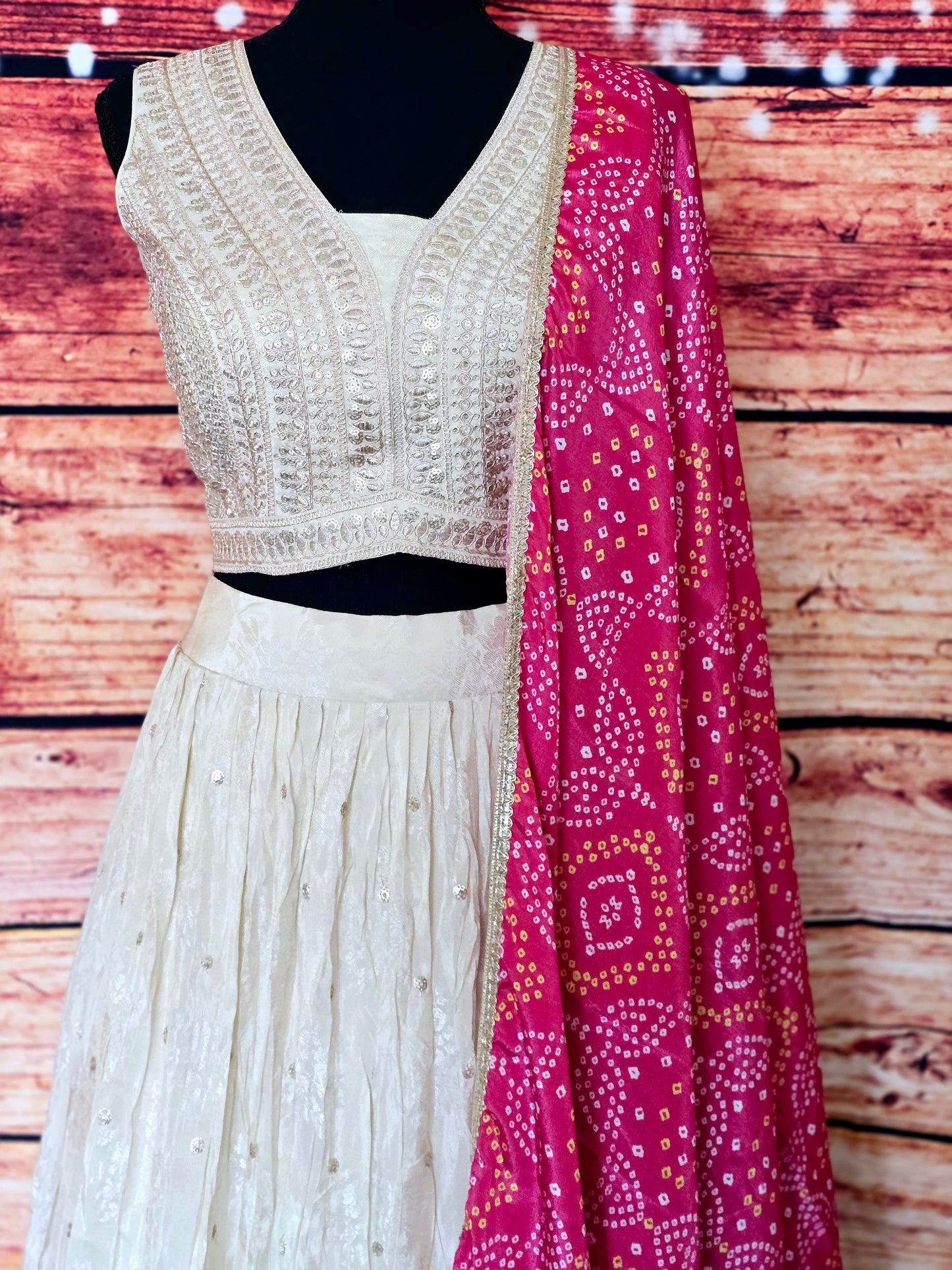 Off white lehenga set with contrast dupatta