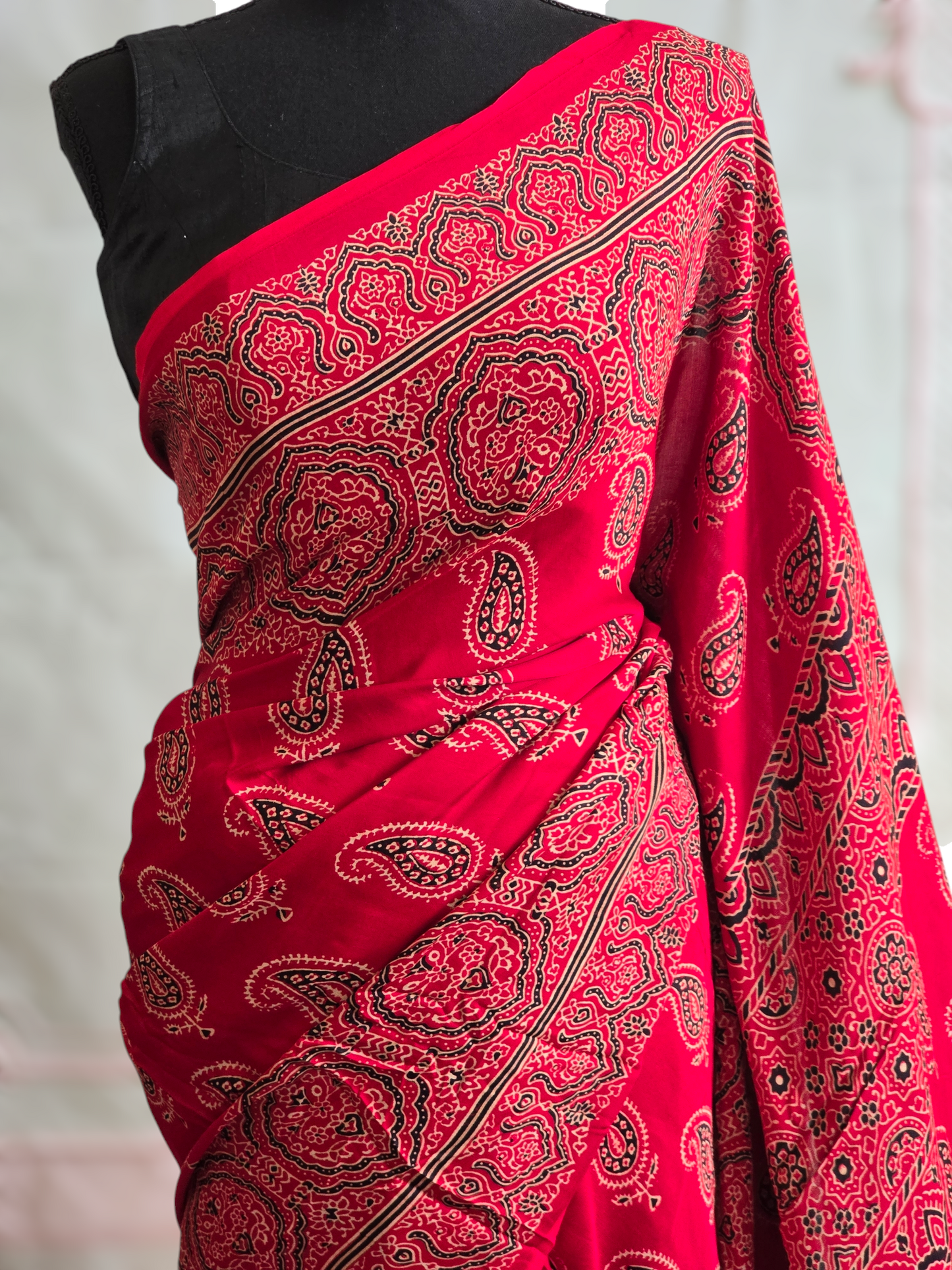 Red modal silk saree with stitched blouse