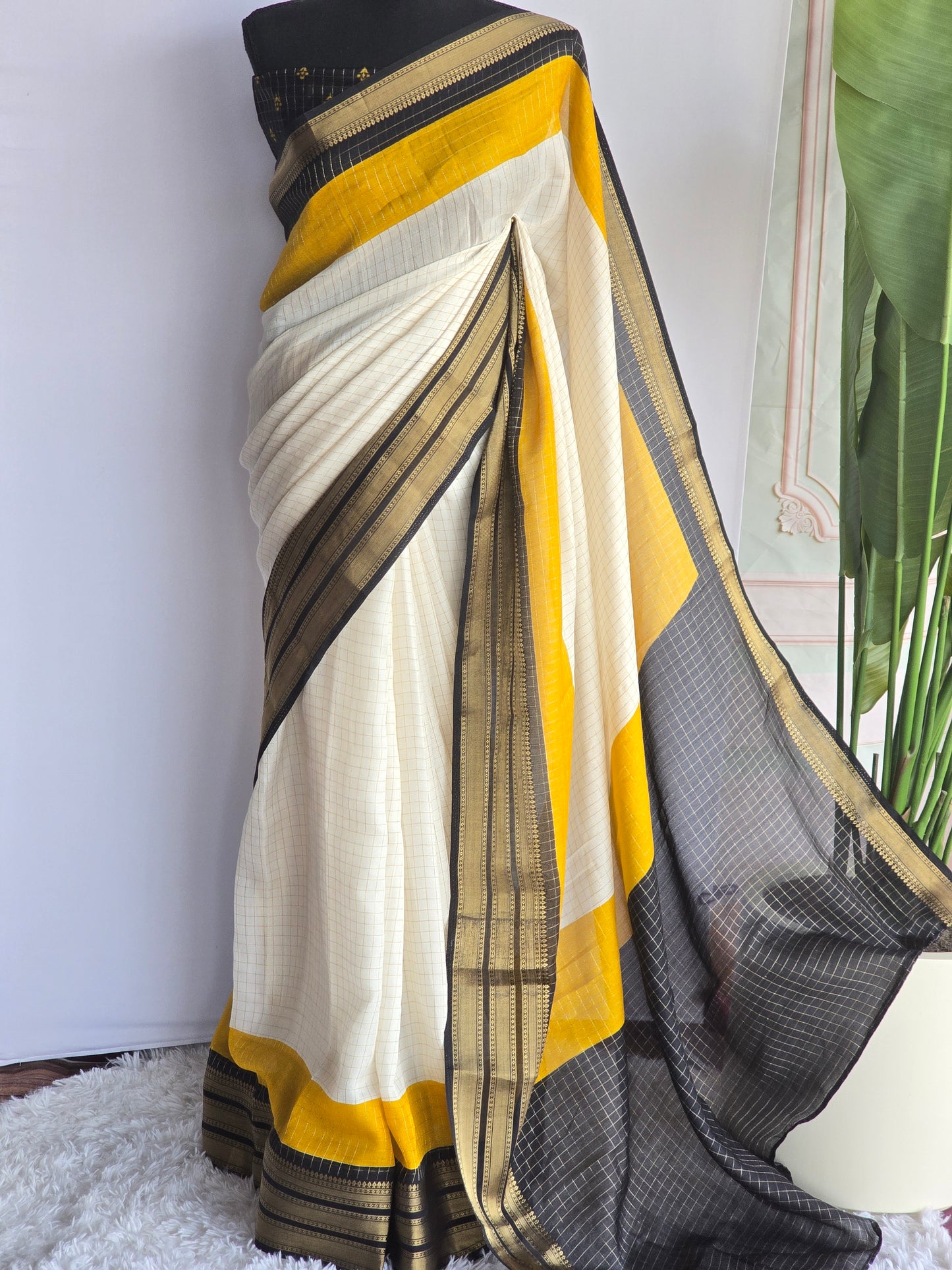 Semi georgette saree with yellow black border-stitched blouse