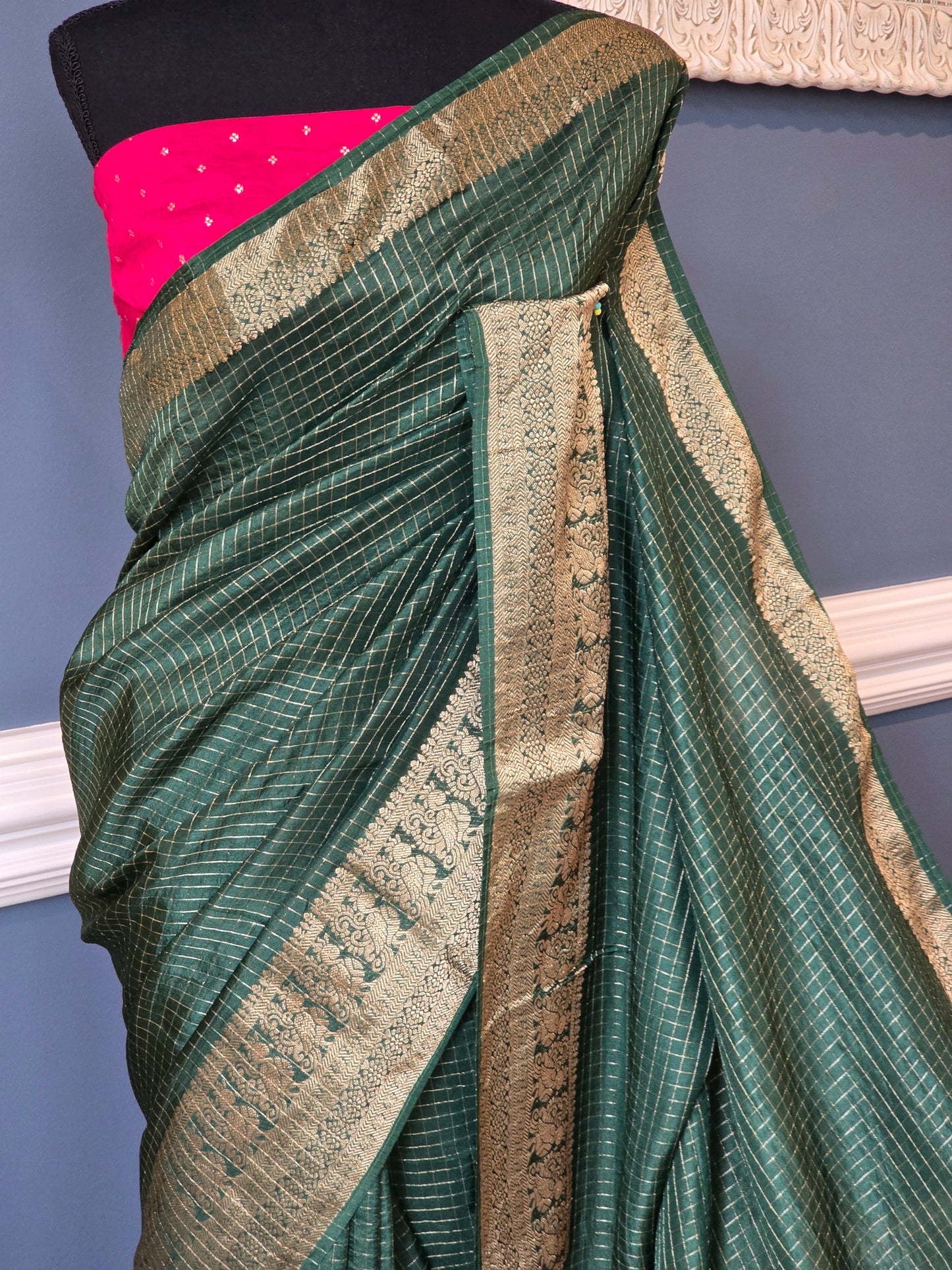 Crape silk saree with check design body= stitched contrast blouse