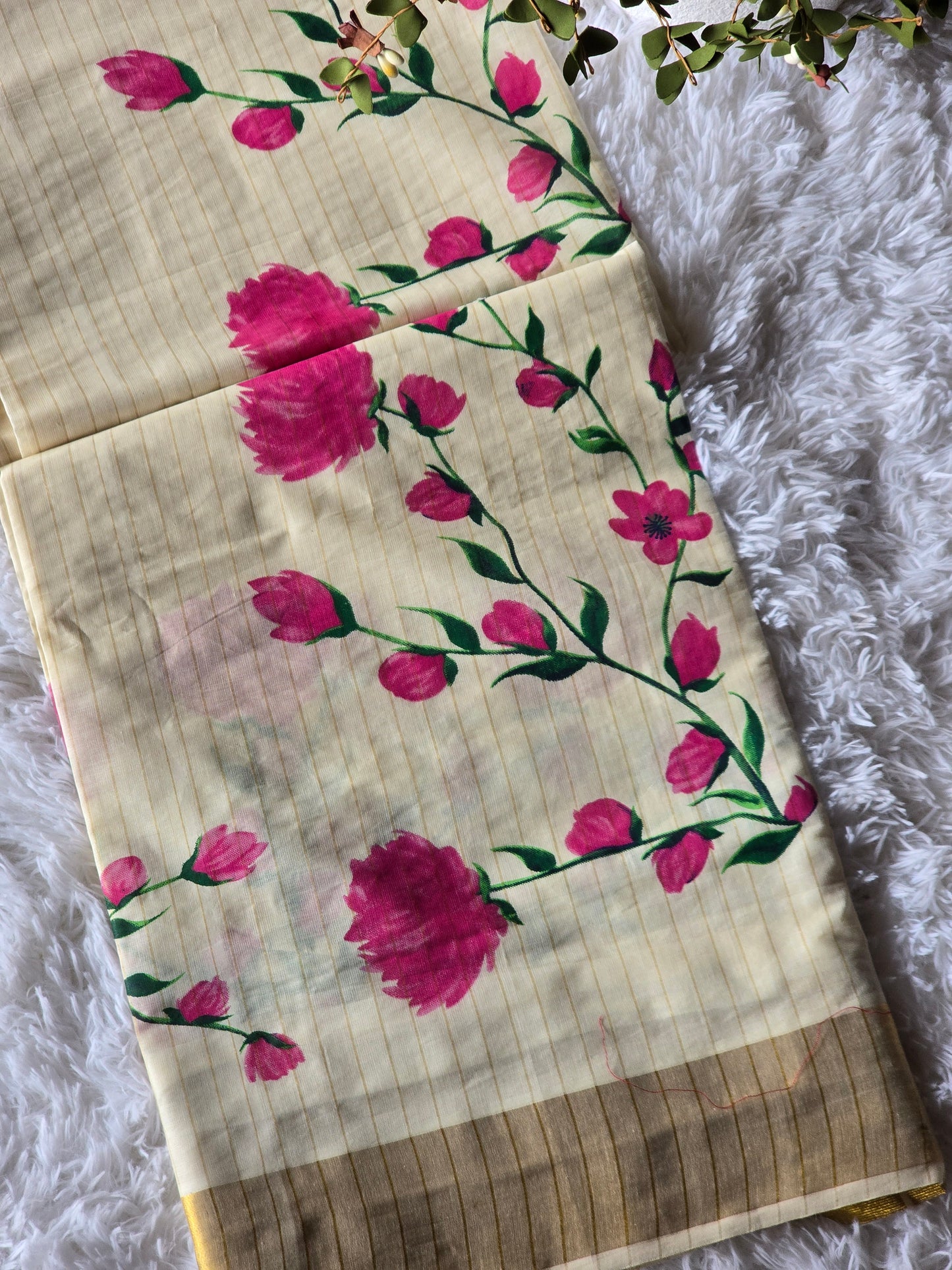 Kerala saree with pink floral-stitched blouse