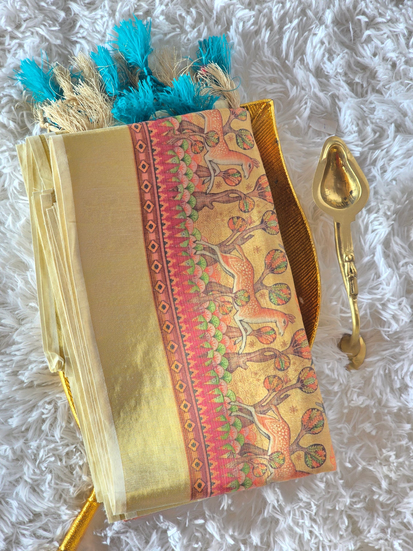 Tissue silk saree with beautiful design border