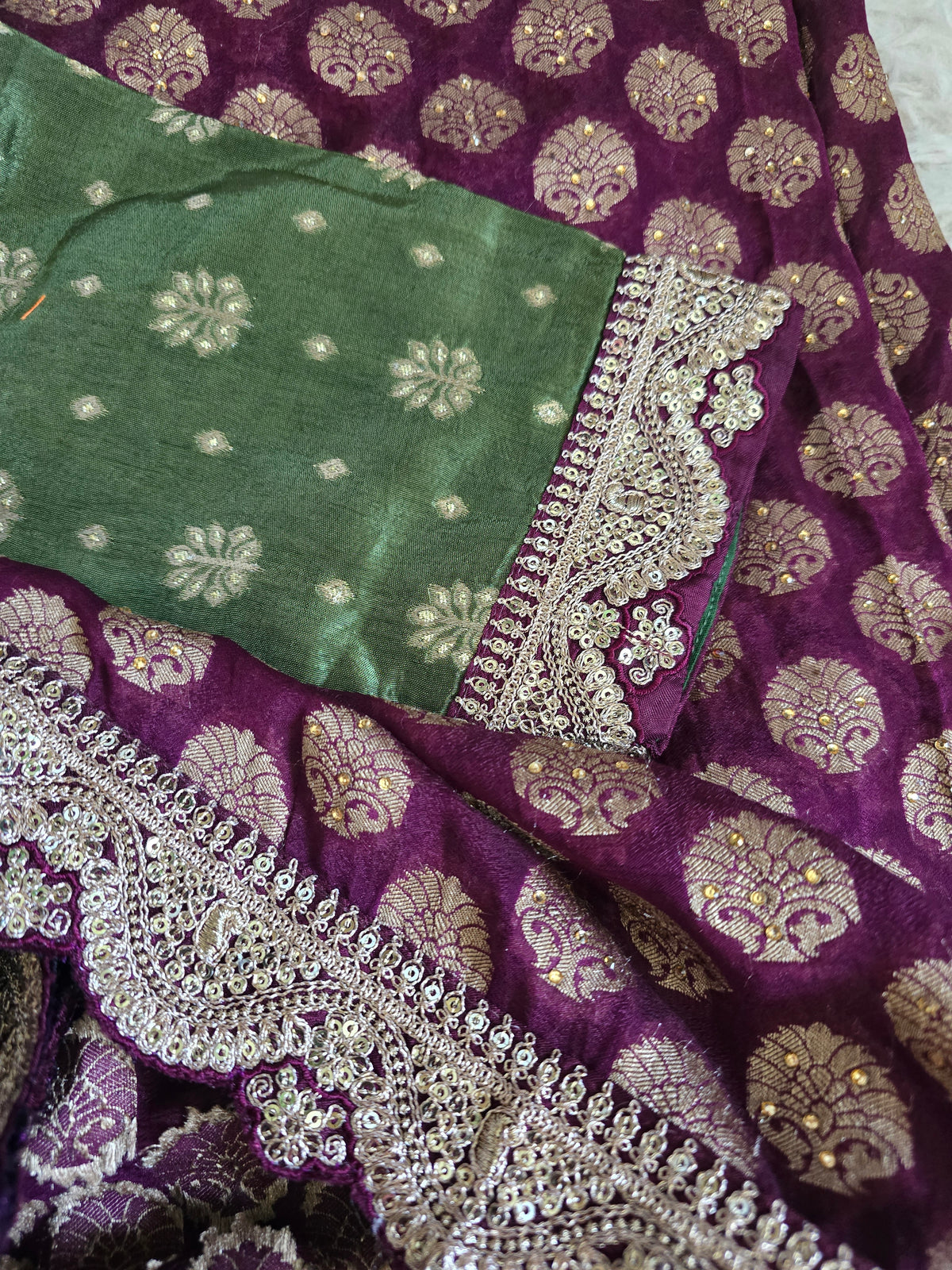 Designer georgette saree with green stitched blouse