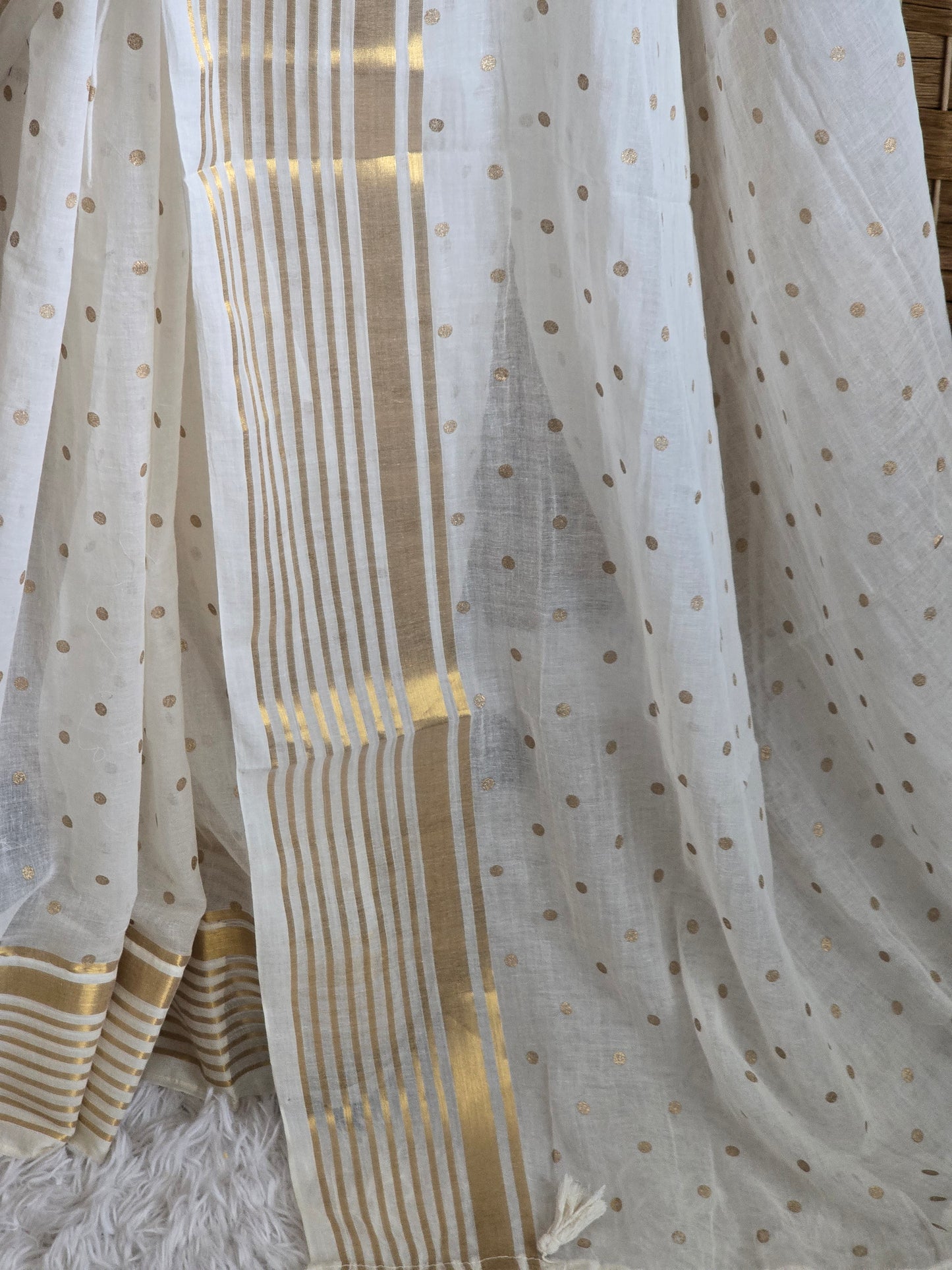 Mul cotton saree with small gold buttas and border (fall and pico done)NO Blouse piece