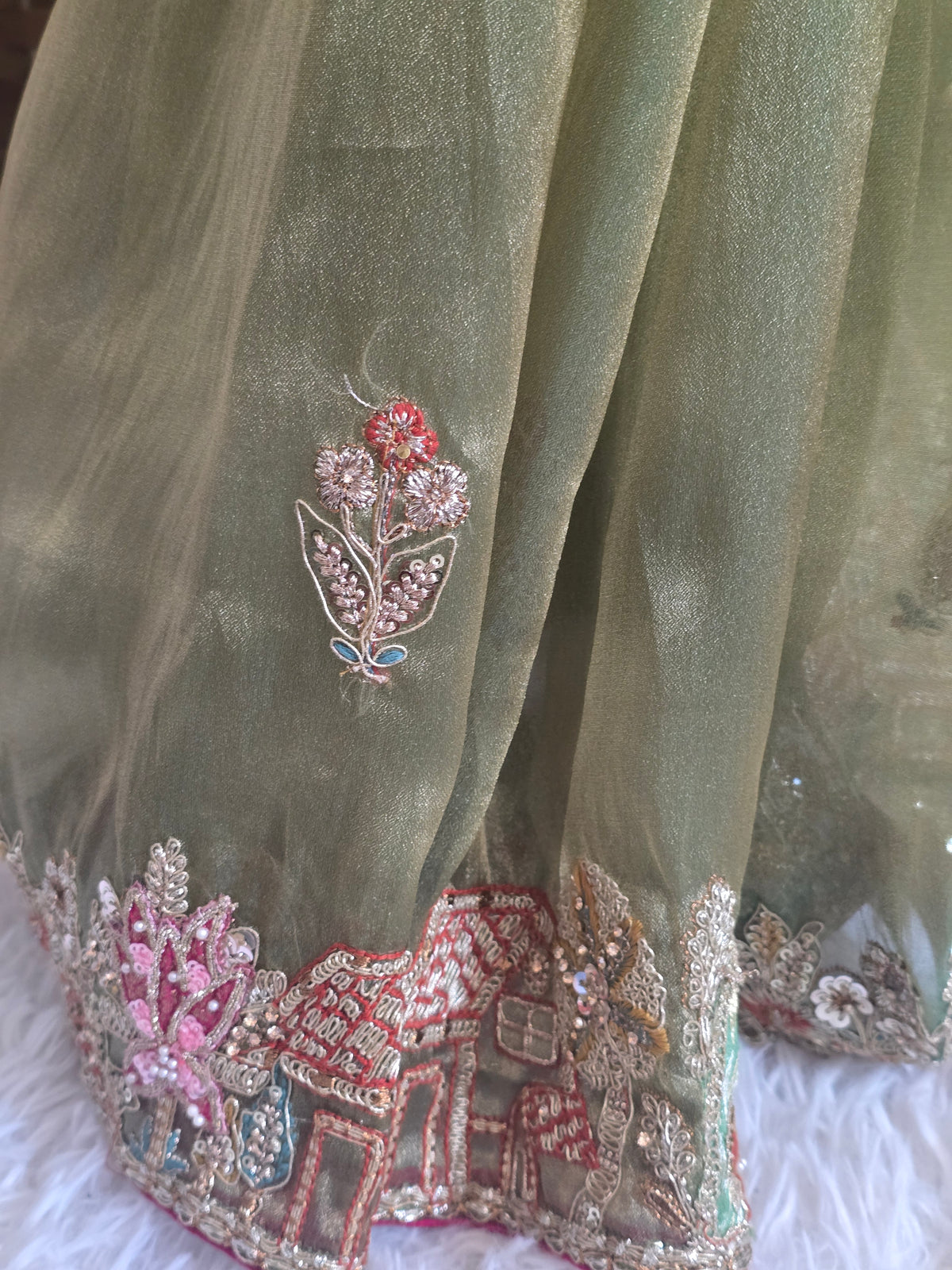 Semi organza saree with beads work- stitched sleevless blouse