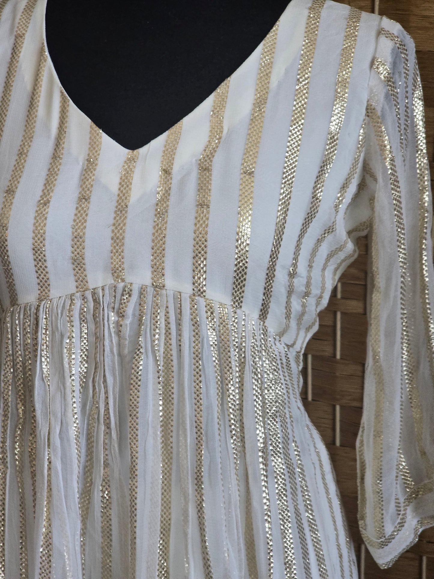 A line kurti with golden stripes ( off white)