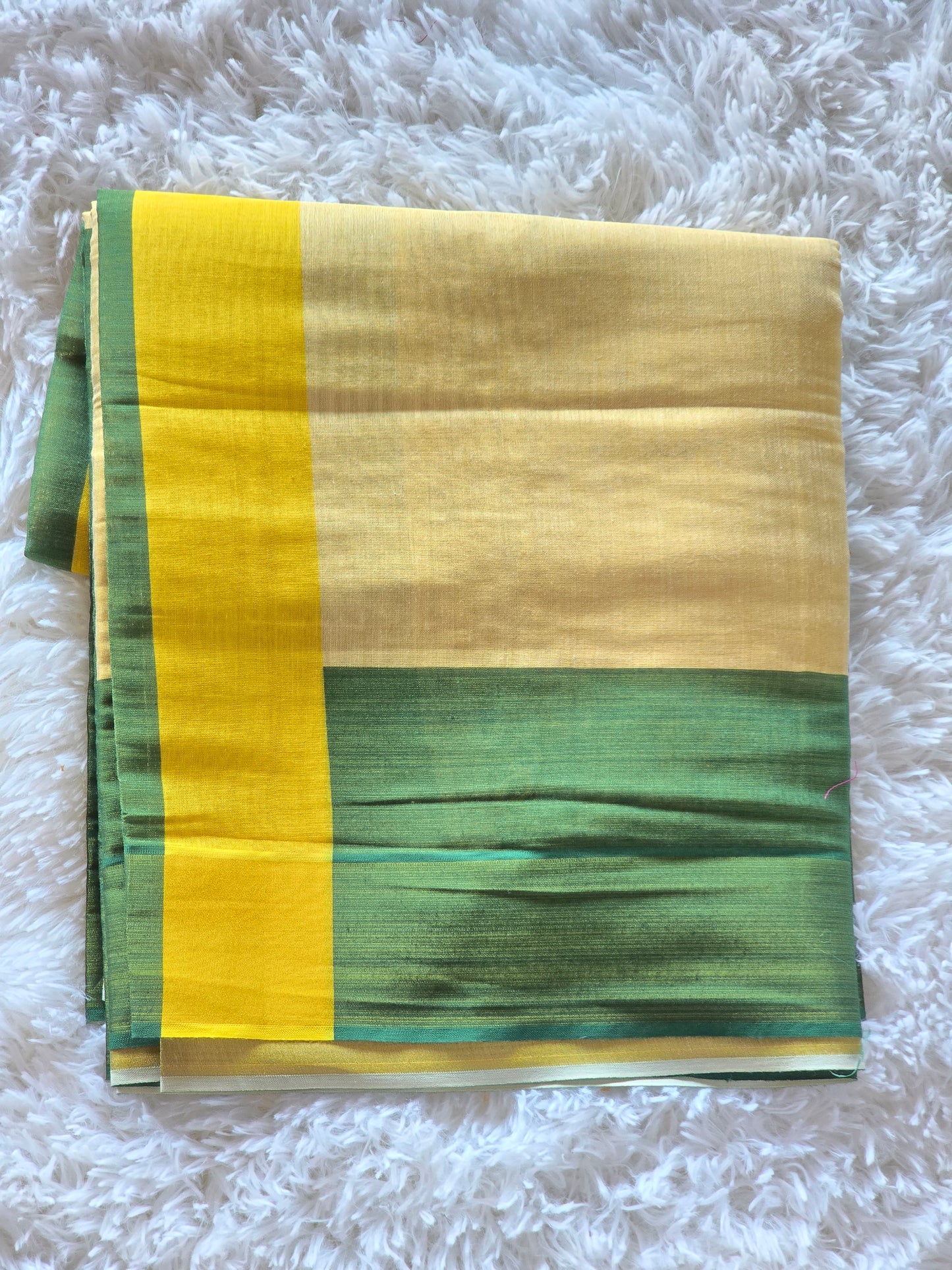 Semi tissue set saree with green and yellow comb