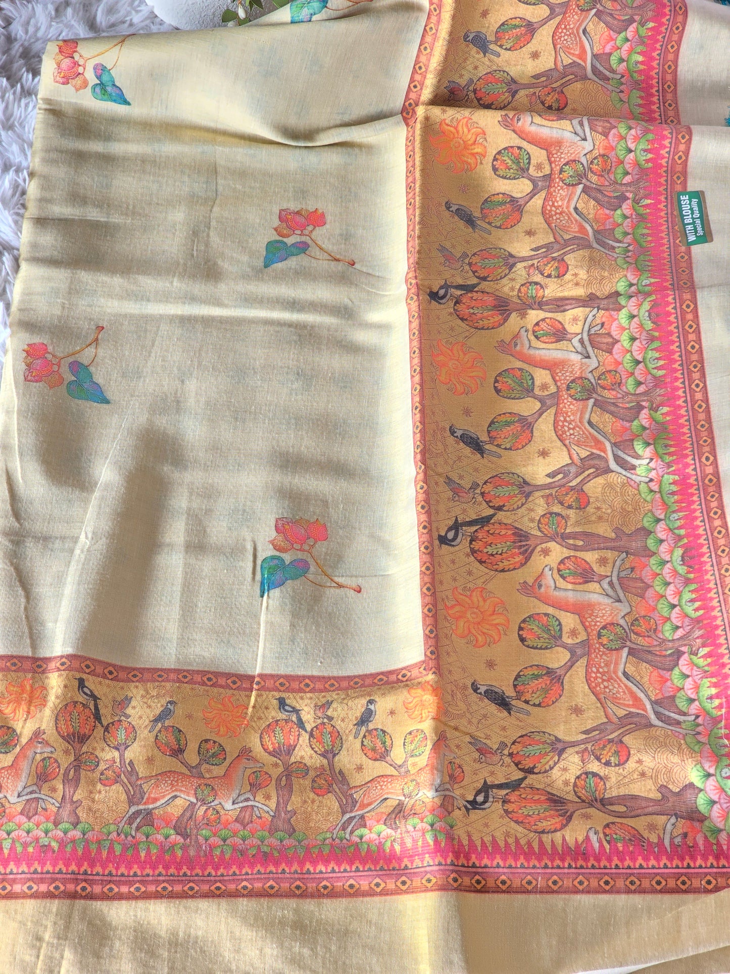 Tissue silk saree with beautiful design border