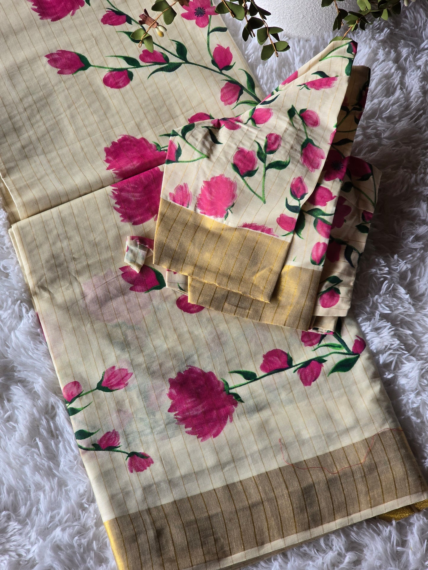 Kerala saree with pink floral-stitched blouse