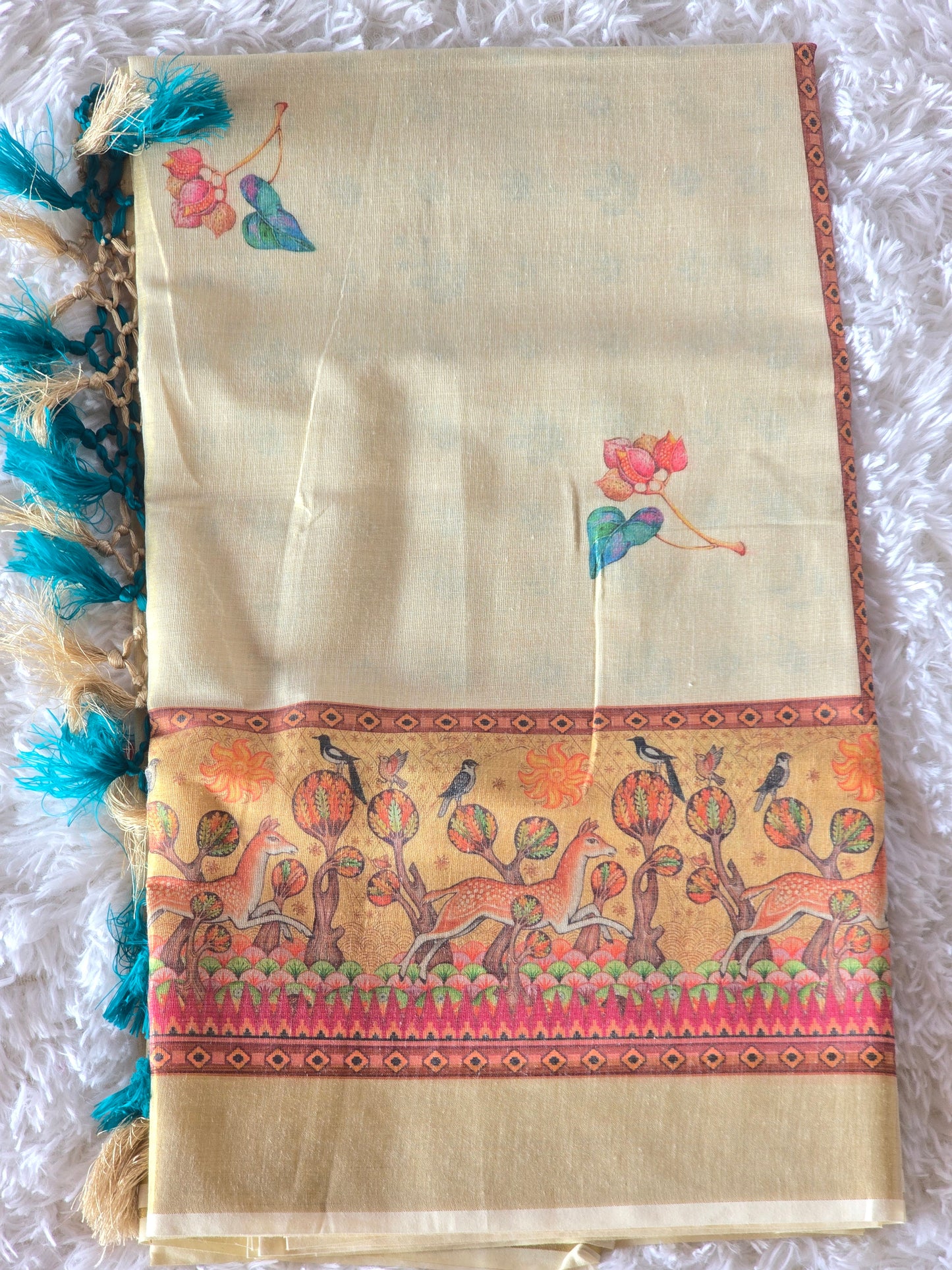 Tissue silk saree with beautiful design border