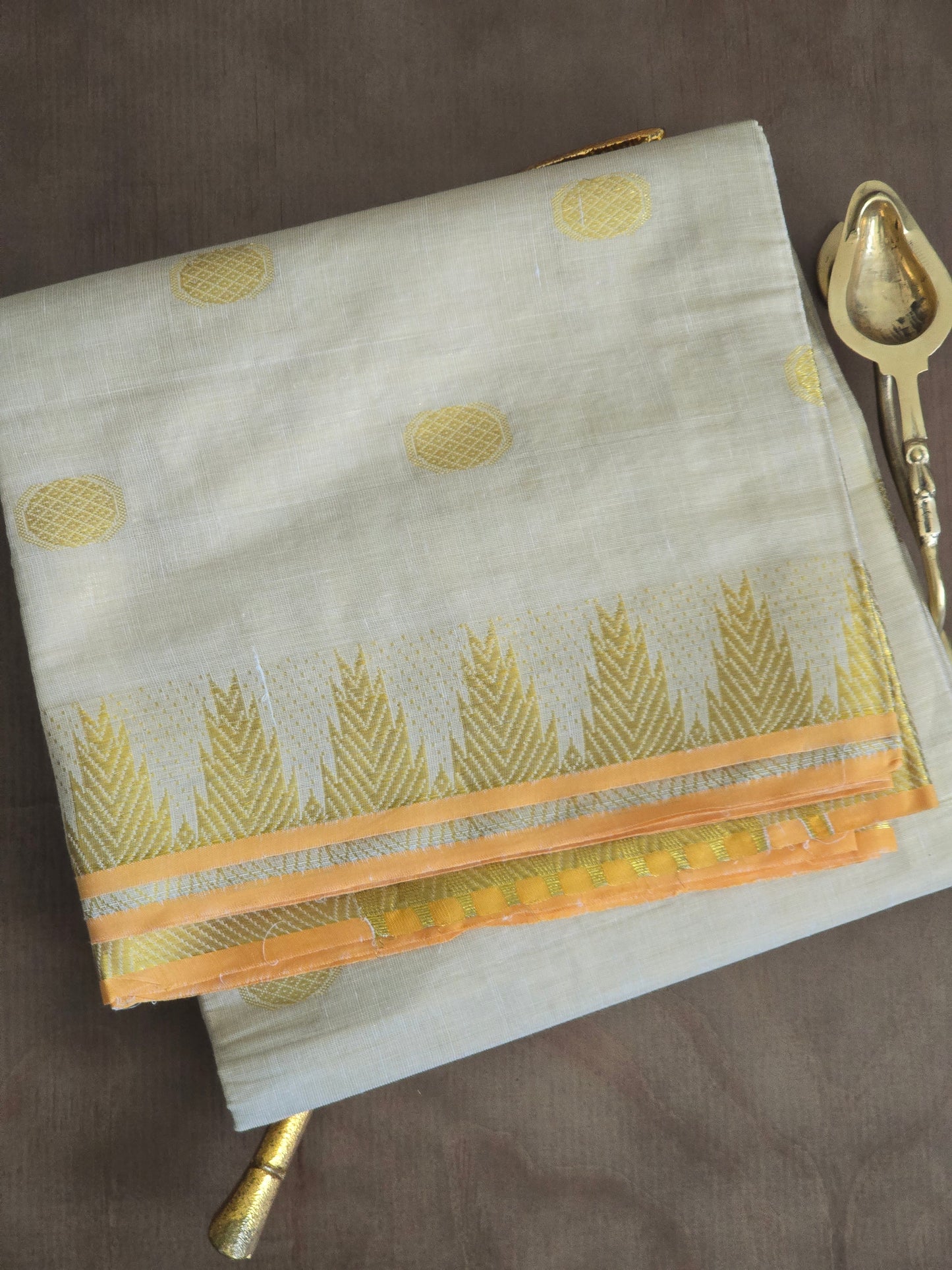 Golden tissue set saree with heavy pallu design and border