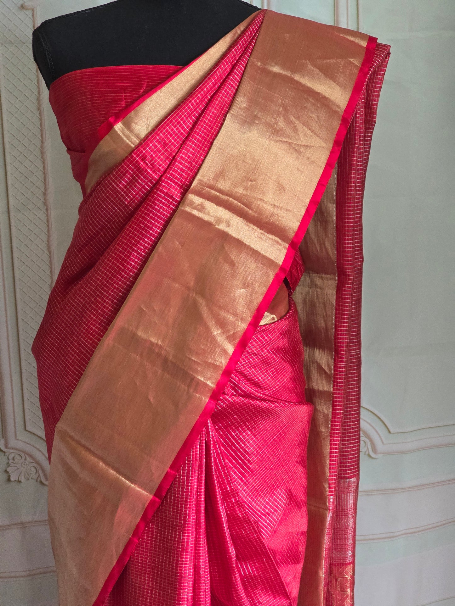 Kancheepuram soft silk check design saree with copper zari-stitched blouse