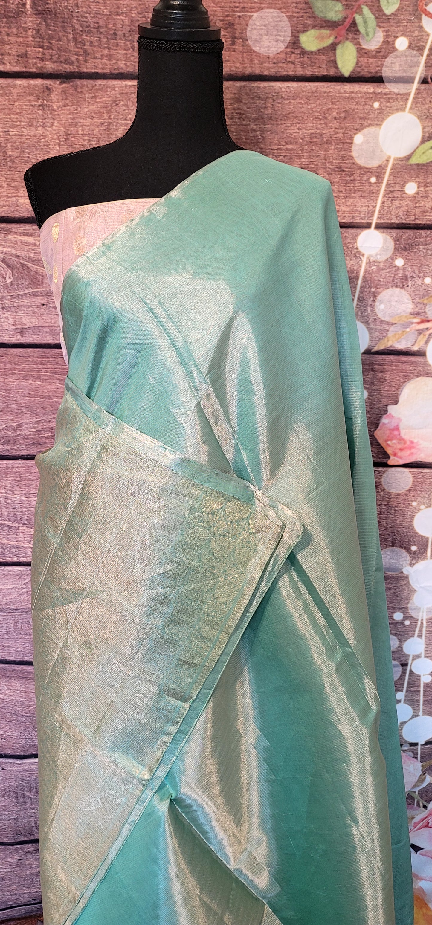 Aqua blue tissue silk saree with light pink Stitched blouse