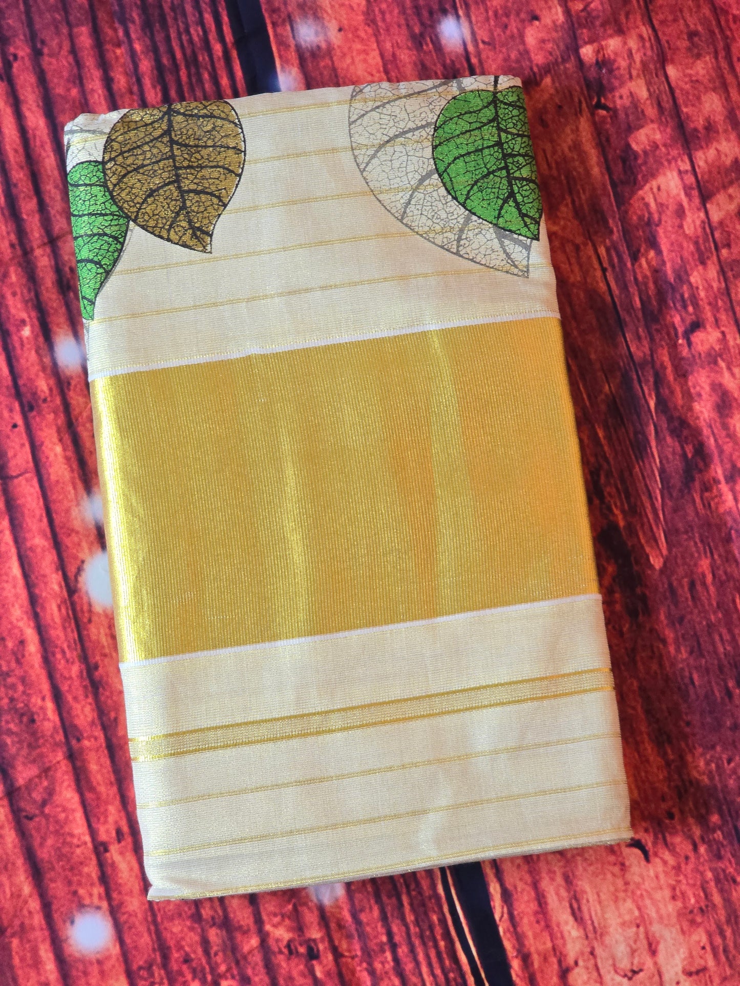 Tissue set saree with multi color leaf design