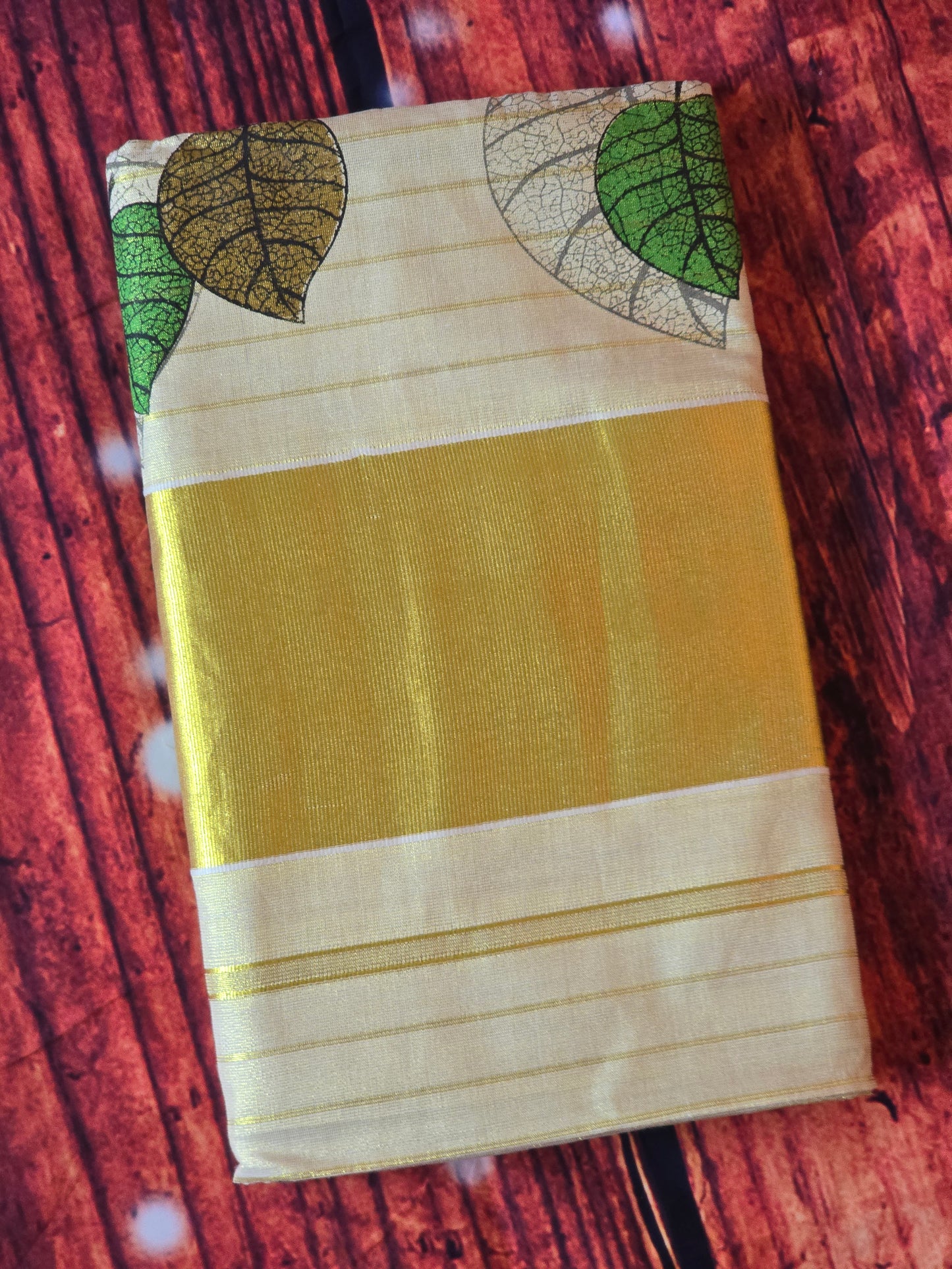 Tissue set saree with multi color leaf design