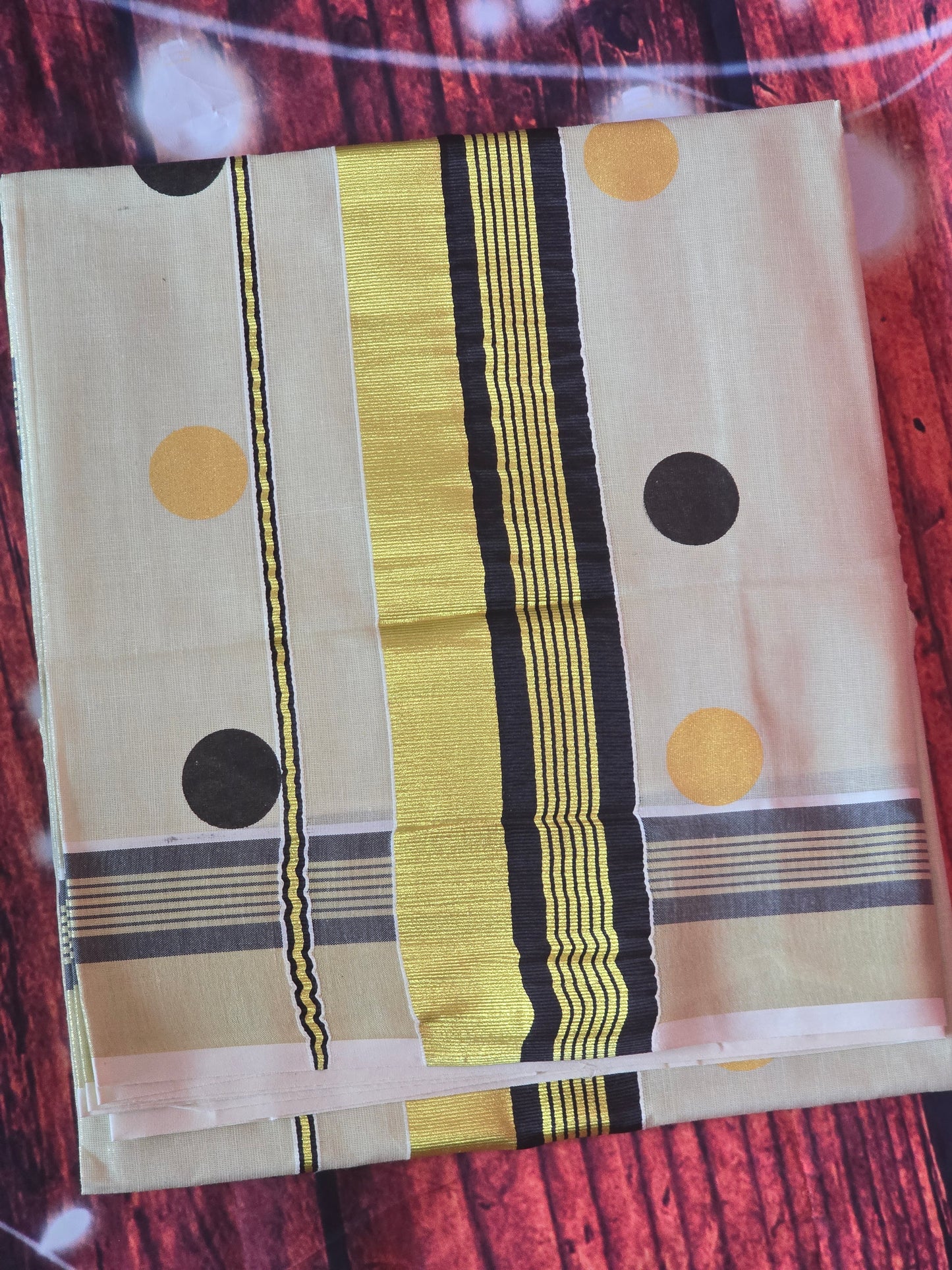 Tissue set saree with black gold polka dots