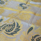 Tissue set saree with dark green/ gold weaving