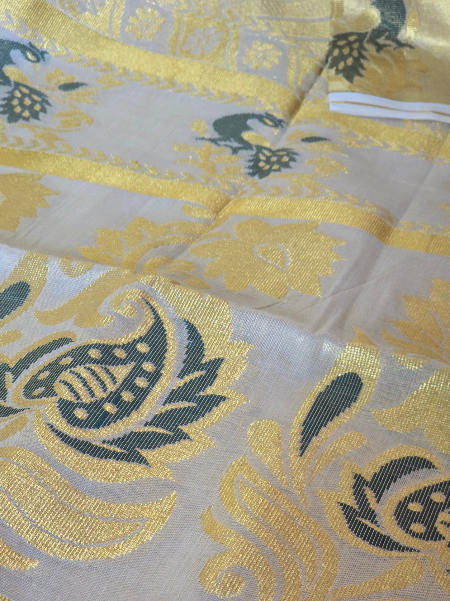 Tissue set saree with dark green/ gold weaving