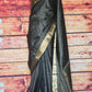 Black check silk saree with copper border- stitched blouse