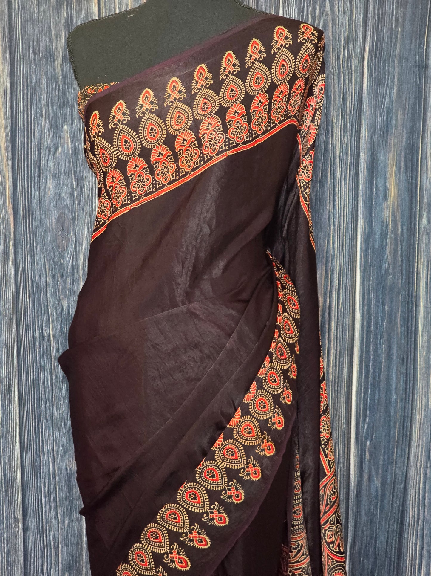 Dark purple modal silk saree with stitched blouse