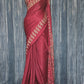 Redish maroon modal silk saree with stitched blouse