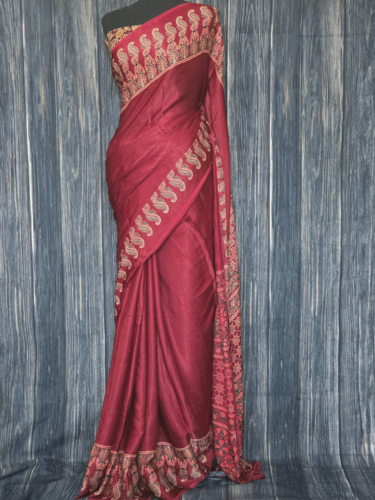 Redish maroon modal silk saree with stitched blouse