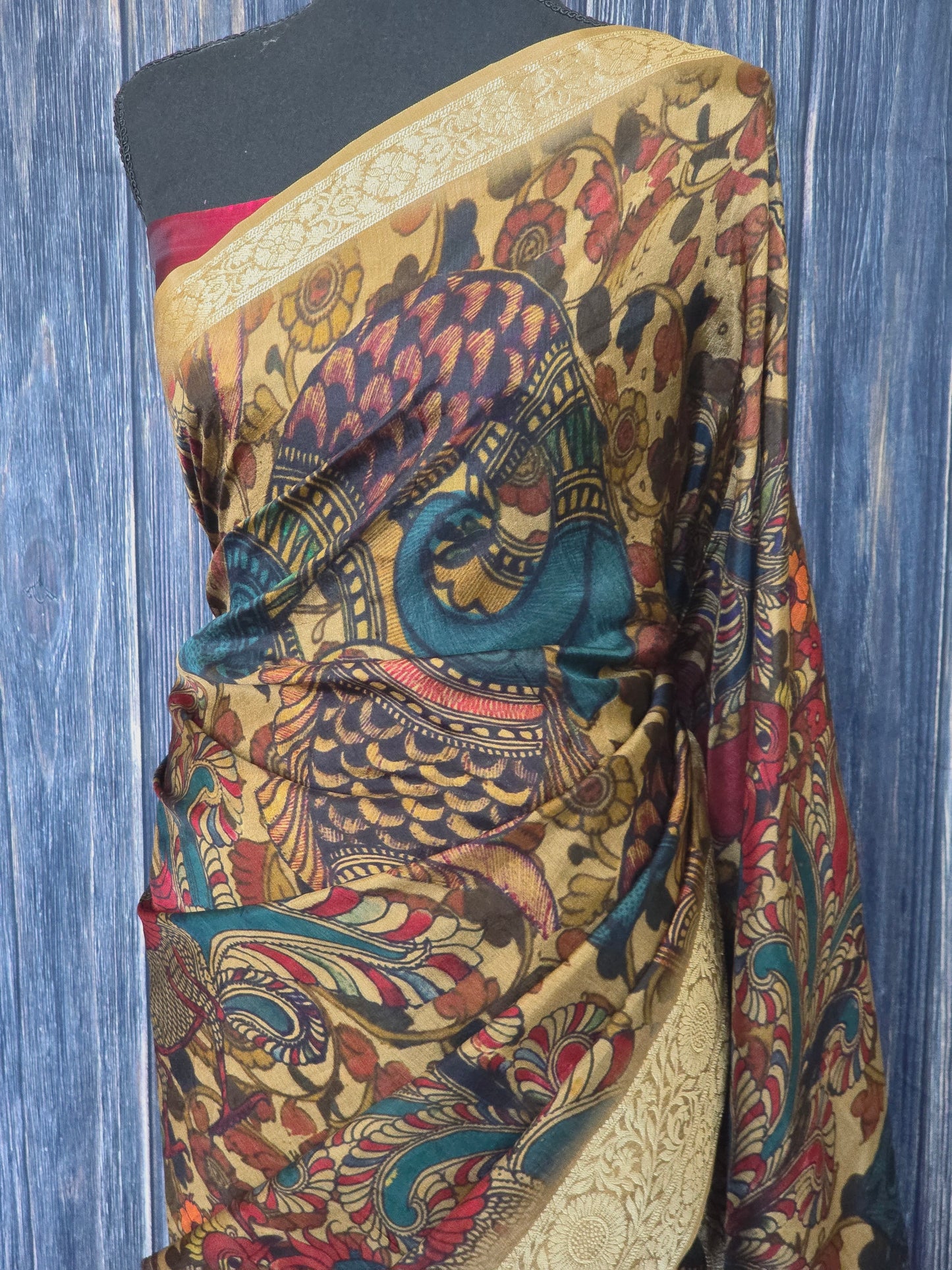 Crape silk saree with all over kalamkari design- plain blouse