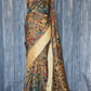 Crape silk saree with all over kalamkari design- plain blouse