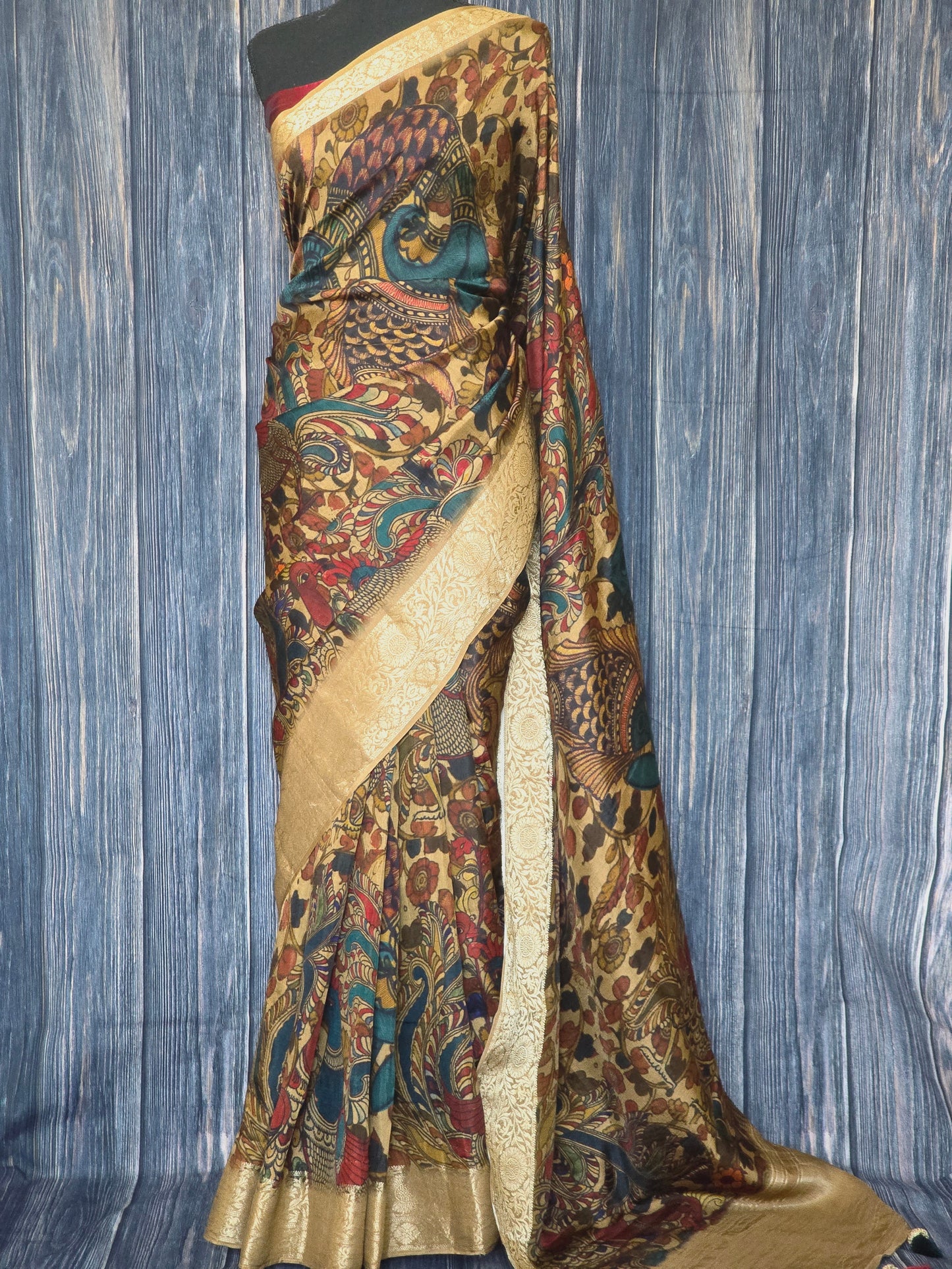 Crape silk saree with all over kalamkari design- plain blouse