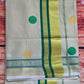 Tissue set saree with green / gold polka dots