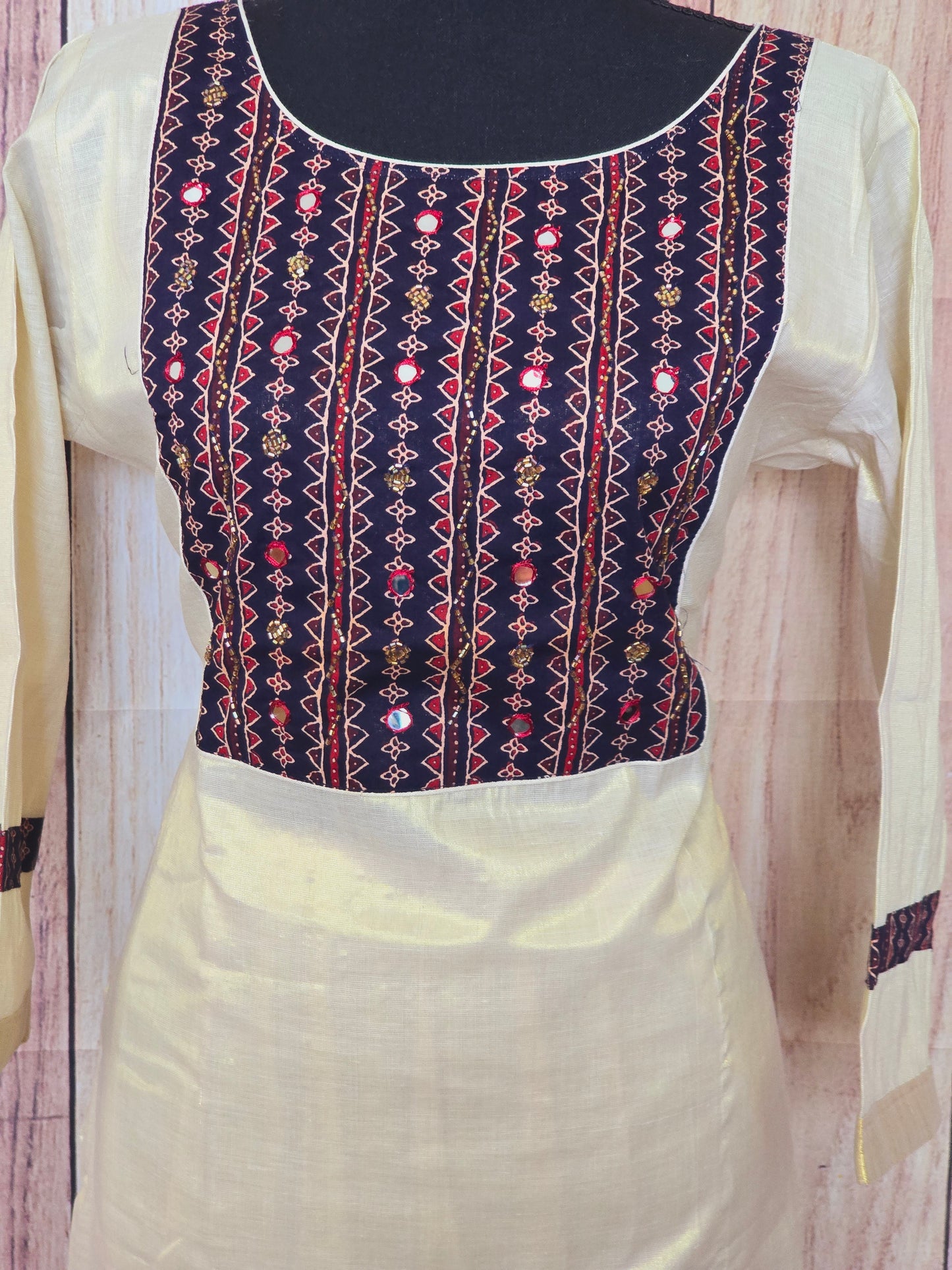 Onam kurti with blue yoke work