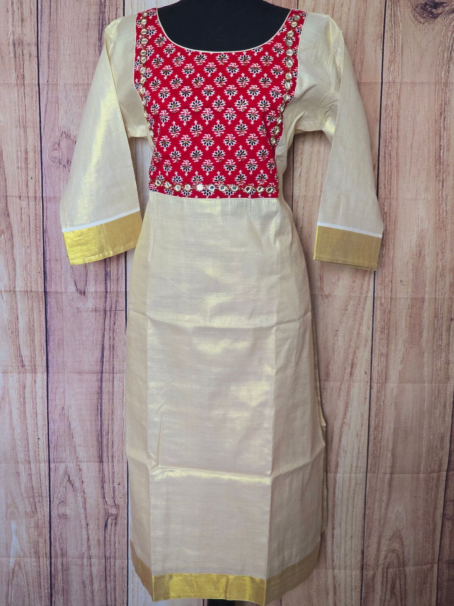 Onam kurti with yoke work