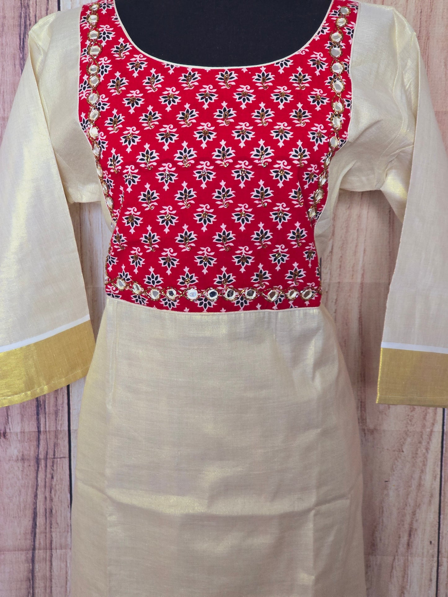 Onam kurti with yoke work