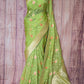 Organza banarasi saree ( pista green) with stitched blouse