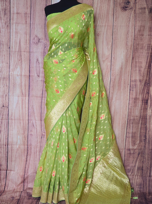 Organza banarasi saree ( pista green) with stitched blouse