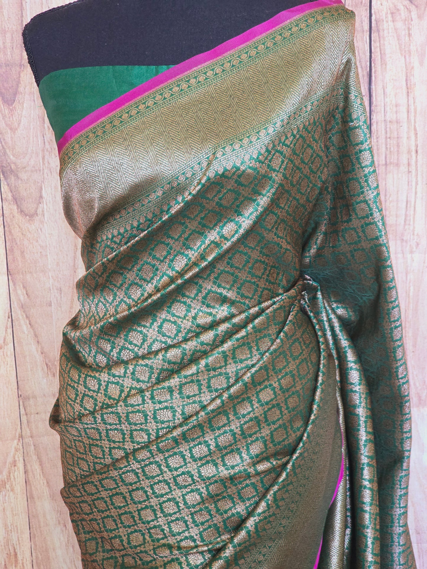 Semi katan silk saree ( bottle green)with stitched blouse