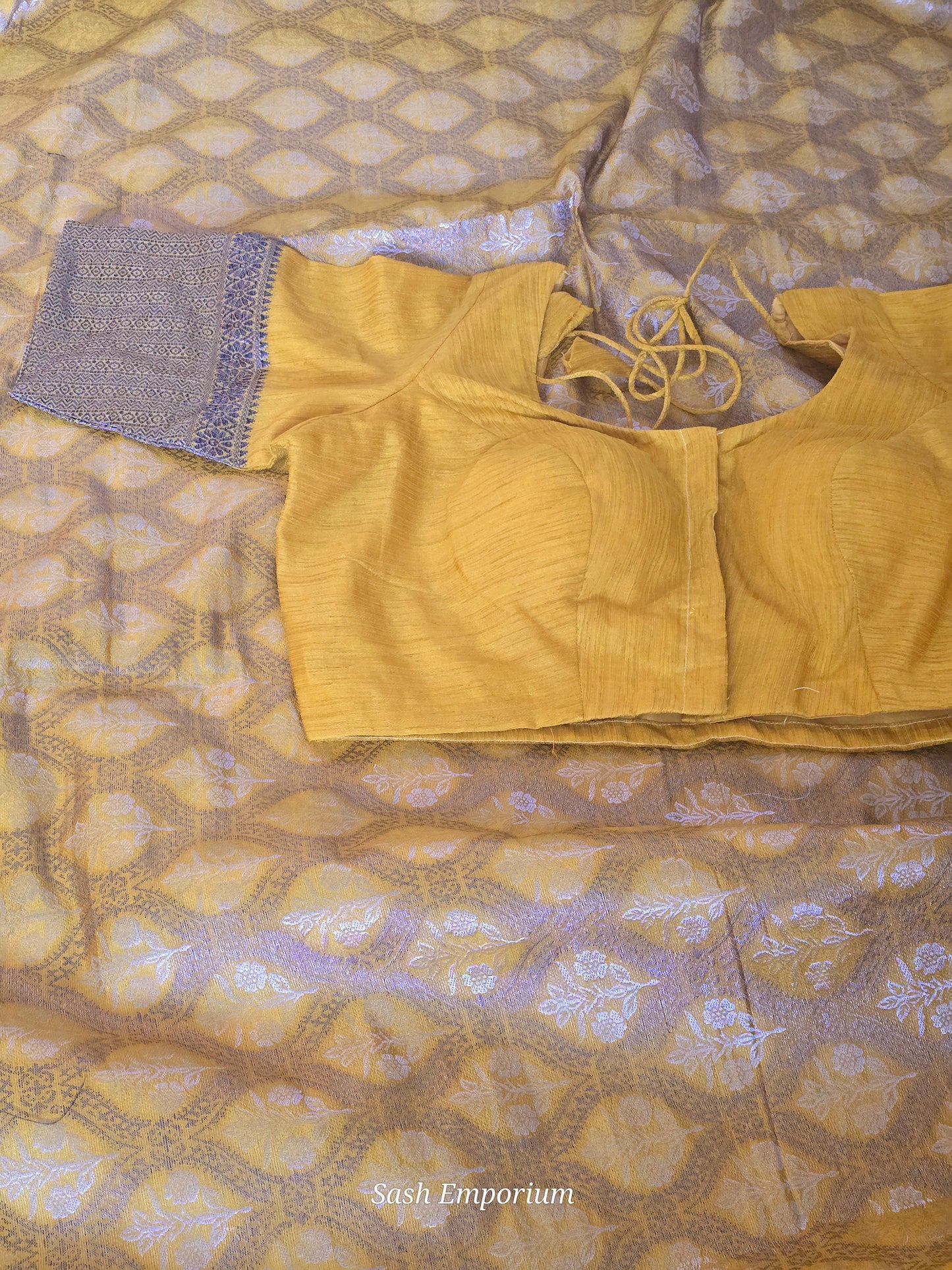 Semi brocade silk( yellow/black) with stitched blouse