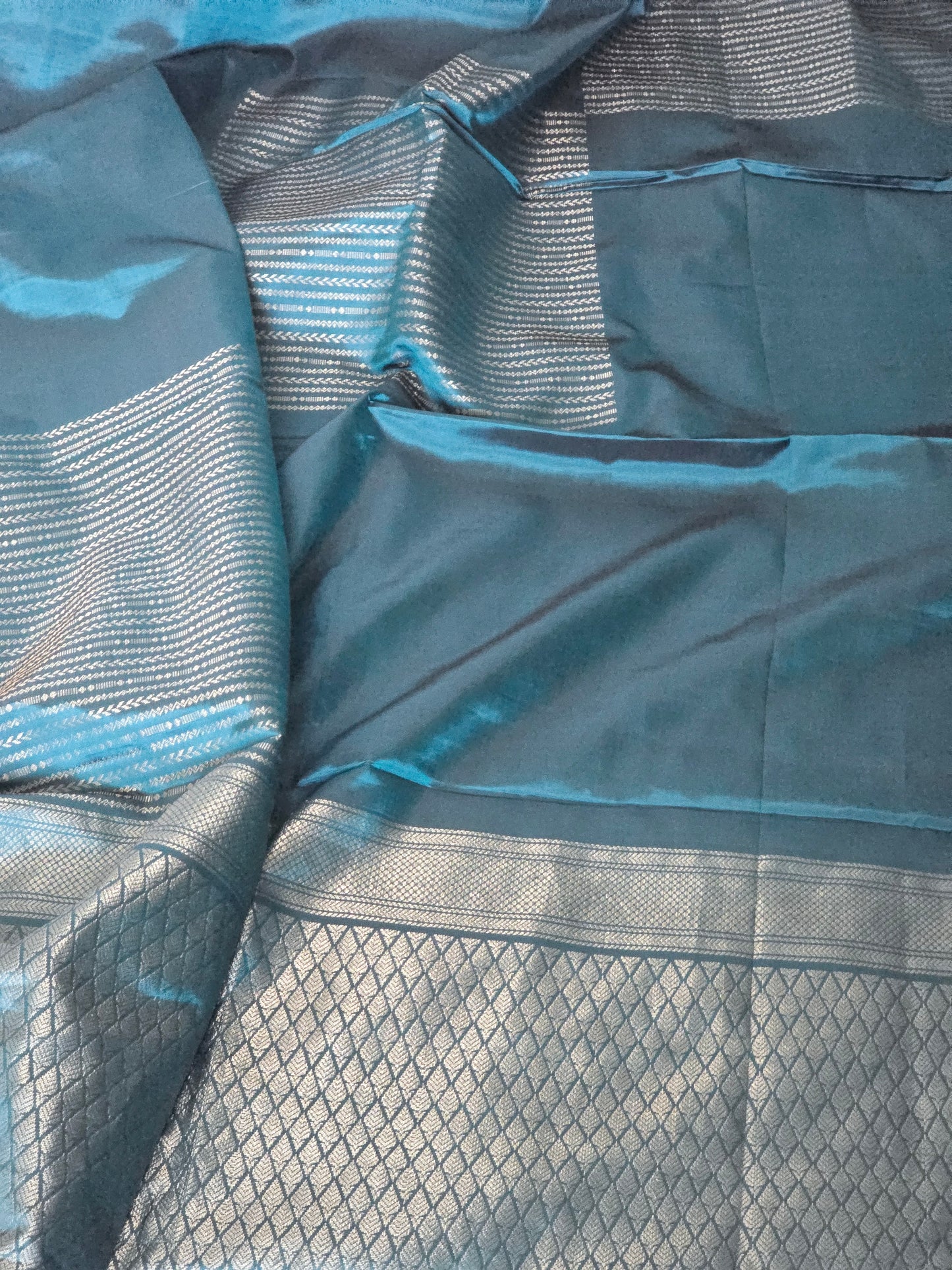 Kanchipuram soft silk saree ( teal blue) with stitched blouse