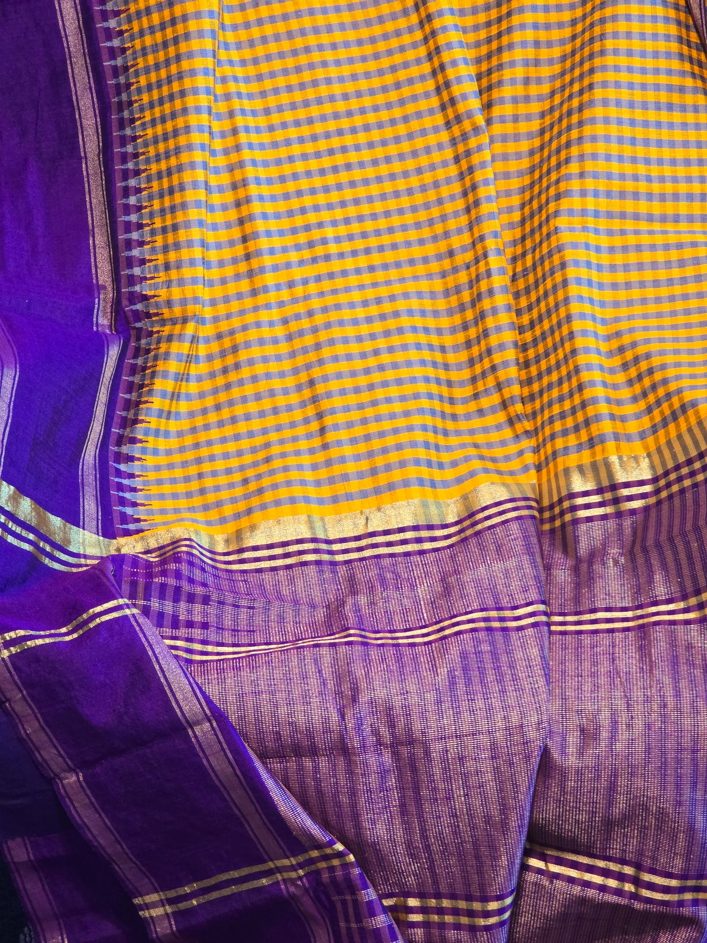 Yellow/purple check design raw silk saree with stitched blouse