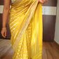 Yellow organza designer saree with stitched blouse