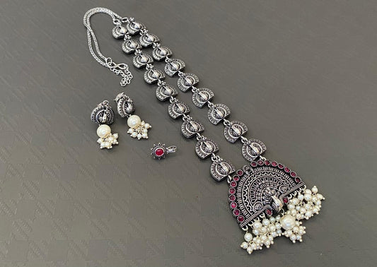 Silver tone necklace with earrings