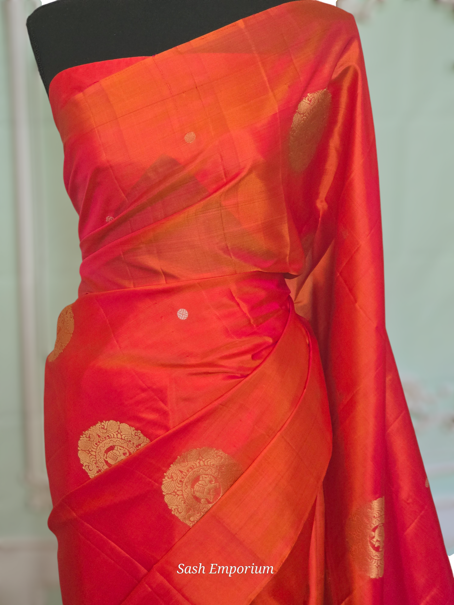 Soft silk ( peach/orange tone) kancheepuram saree with stitched blouse