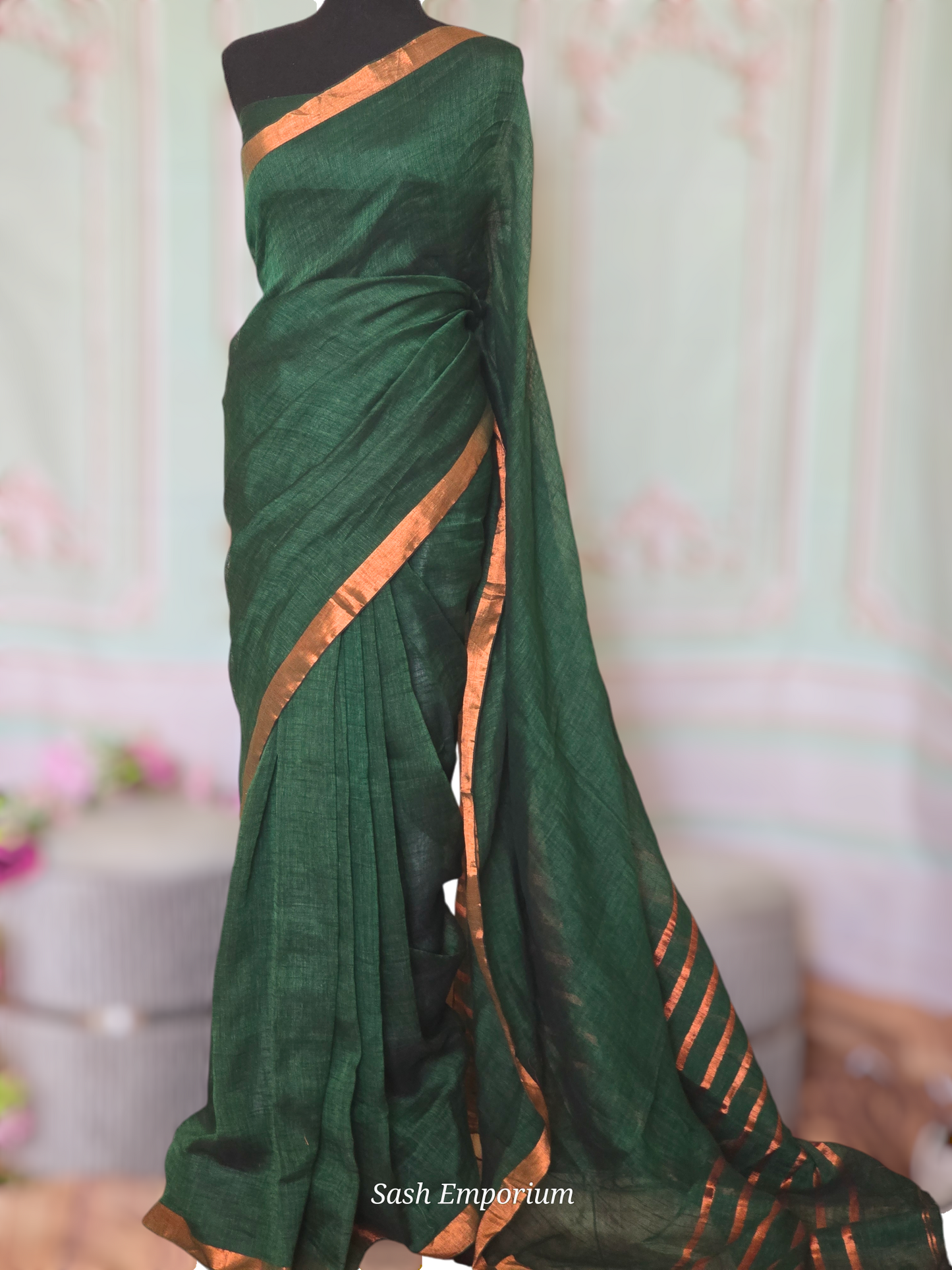 Bottle green/copper linen saree with stitched blouse