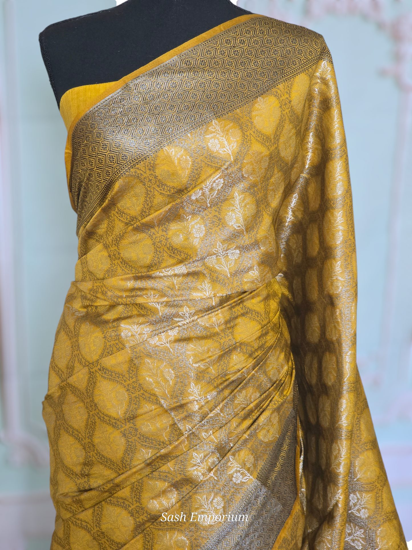 Semi brocade silk( yellow/black) with stitched blouse