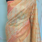 Soft linen tissue saree ( beige/peach) with all over thread sequins work- stitched blouse