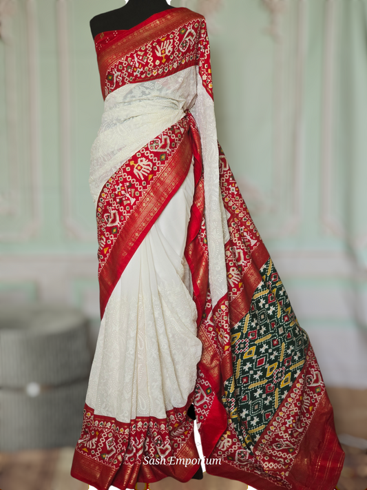 White/Red chiffon saree with white chikankari work on body and  patola border