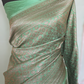 Semi katan silk saree(mint green) with silver/antique design- stitched blouse