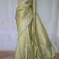 Pista green crushed organza saree with thread work- stitched blouse