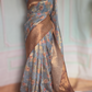 Sky blue floral print ( sky blue/brown) saree with stitched blouse