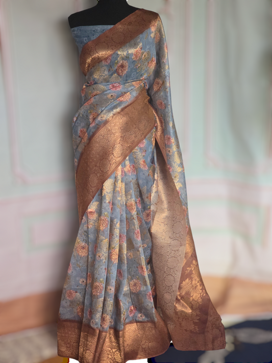 Sky blue floral print ( sky blue/brown) saree with stitched blouse